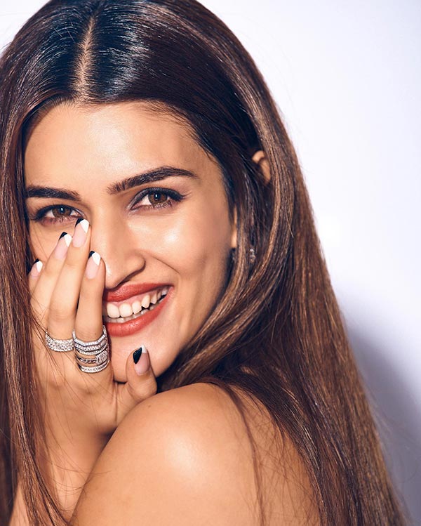 Kriti Sanon sexy legs high slit white dress