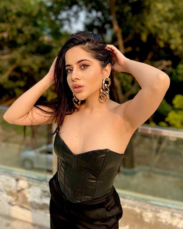 Urfi Javed black off shoulder dress