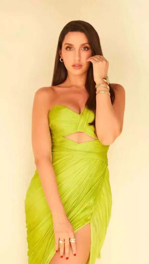 nora fatehi cleavage green dress nora fatehi cleavage green dress