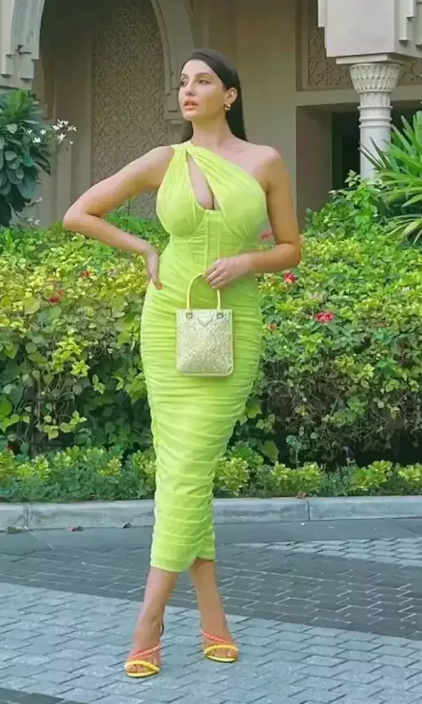 nora fatehi green dress cleavage curvy figure nora fatehi green dress cleavage curvy figure