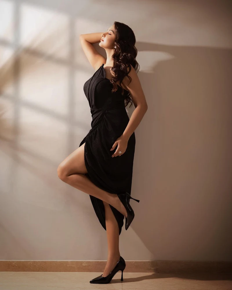Esshanya Maheshwari high slit black dress sexy legs curvy