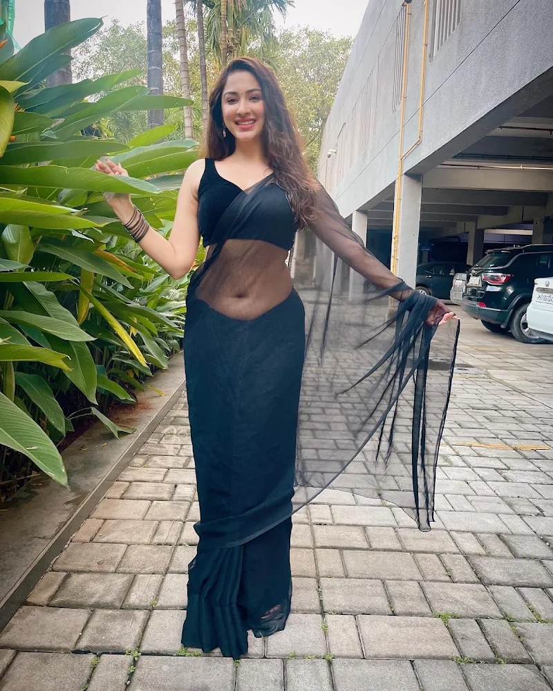 Esshanya Maheshwari navel sheer black saree Esshanya Maheshwari navel sheer black saree
