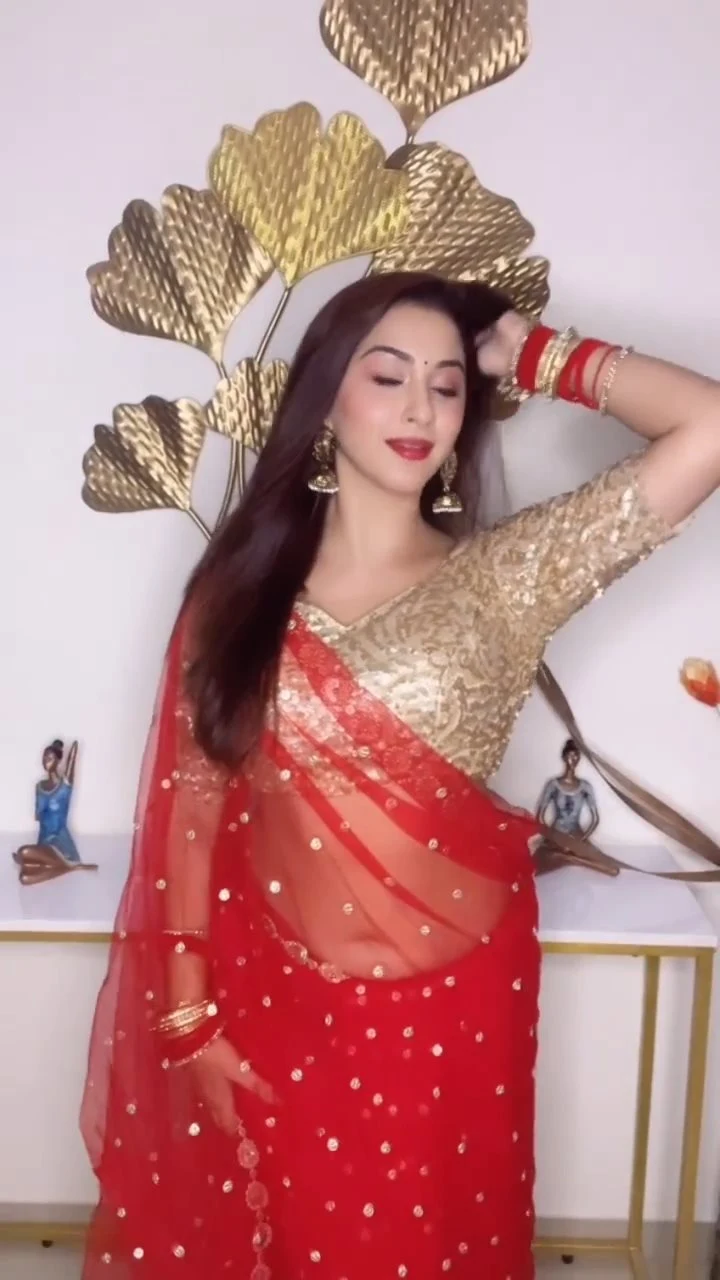 esshanya maheshwari navel red sheer saree curvy indian actress