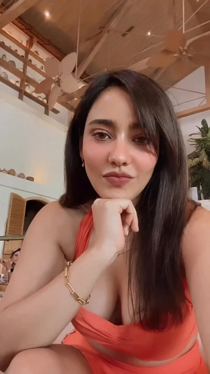 Neha SHarma cleavage orange dress Neha SHarma cleavage orange dress