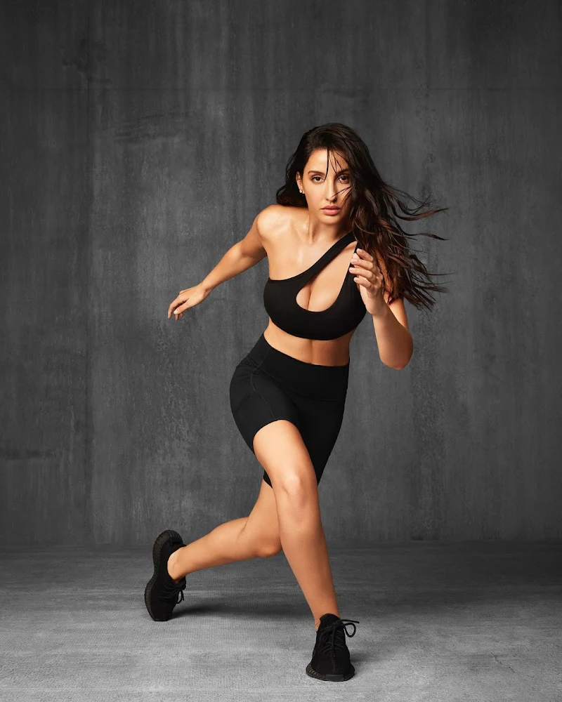 Nora Fatehi cleavage sexy legs sports bra shorts Nora Fatehi cleavage sexy legs sports bra shorts