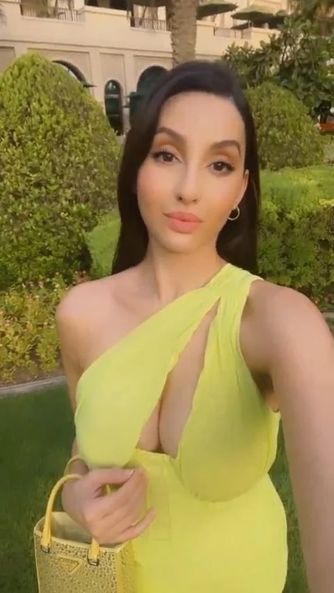 Nora Fatehi cleavage neon green dress Nora Fatehi cleavage neon green dress