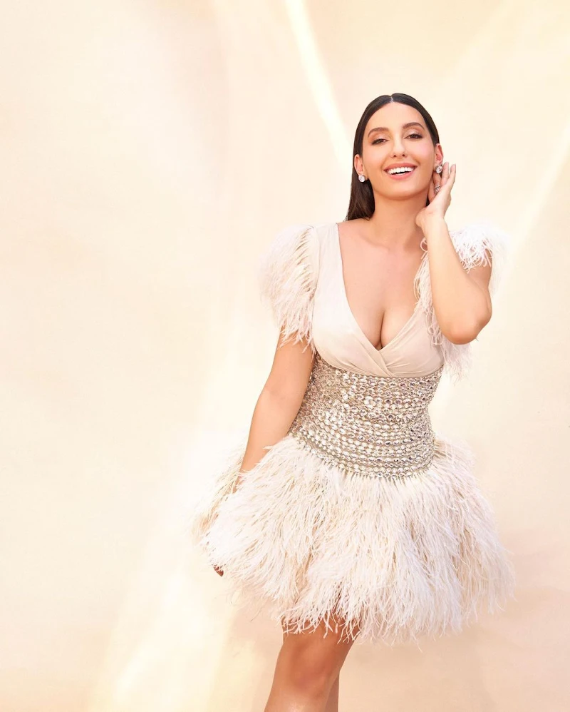 Nora Fatehi cleavage short dress