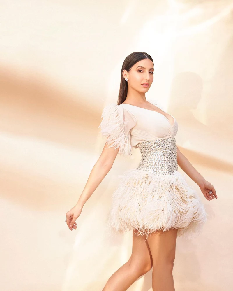 Nora Fatehi cleavage short dress