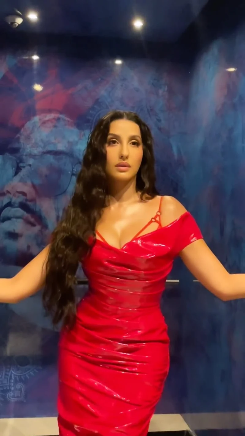Nora Fatehi curvy red latex dress iifa Nora Fatehi curvy red latex dress iifa