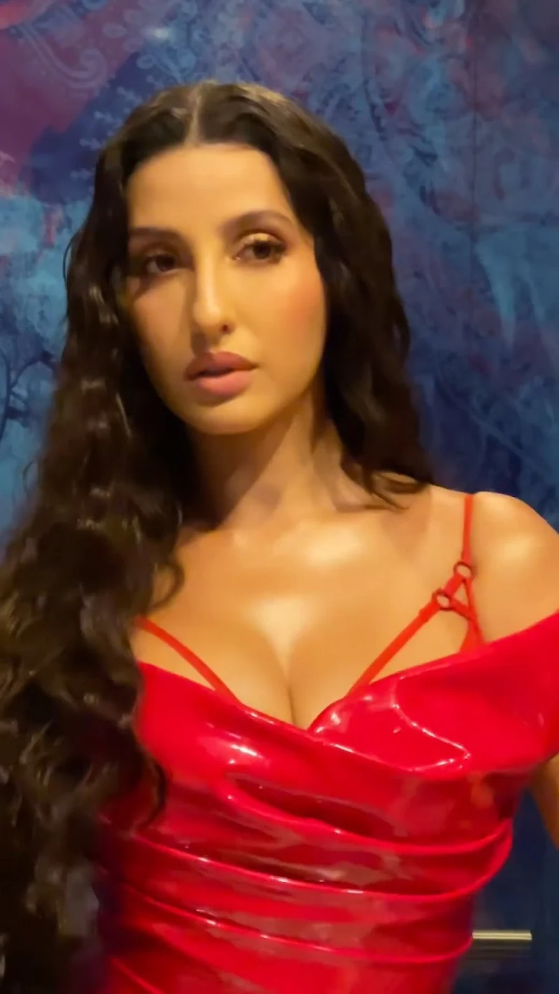 Nora Fatehi curvy red latex dress iifa Nora Fatehi curvy red latex dress iifa