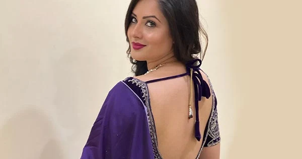 Puja Banerjee in backless blouse raised the temperature with her stunning hot looks.