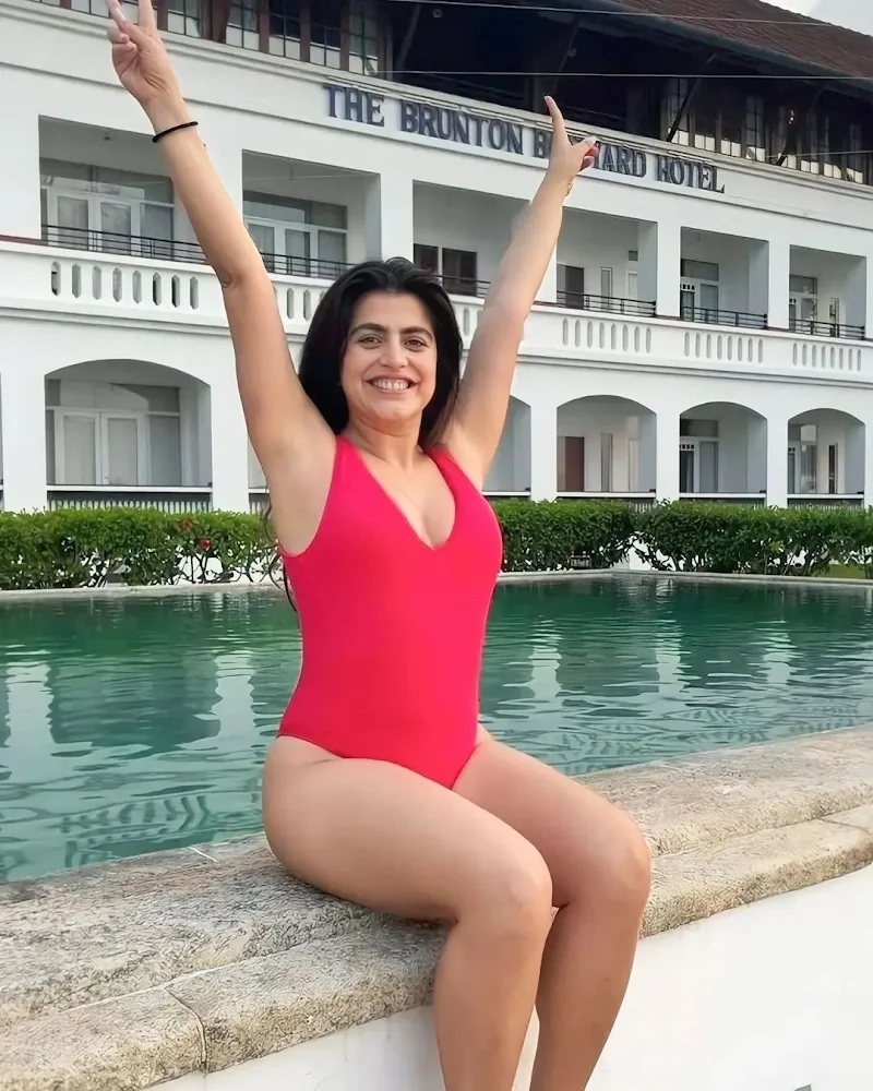 Shenaz Treasurywala red swimsuit baywatch look