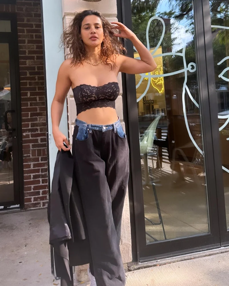 aisha sharma lacy bralette cleavage