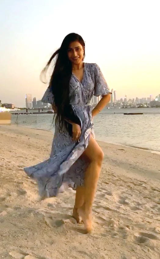 dhanashree verma high slit sexy legs