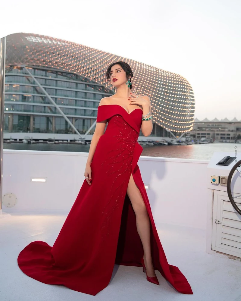Divya Khosla Kumar red dress cleavage sexy legs