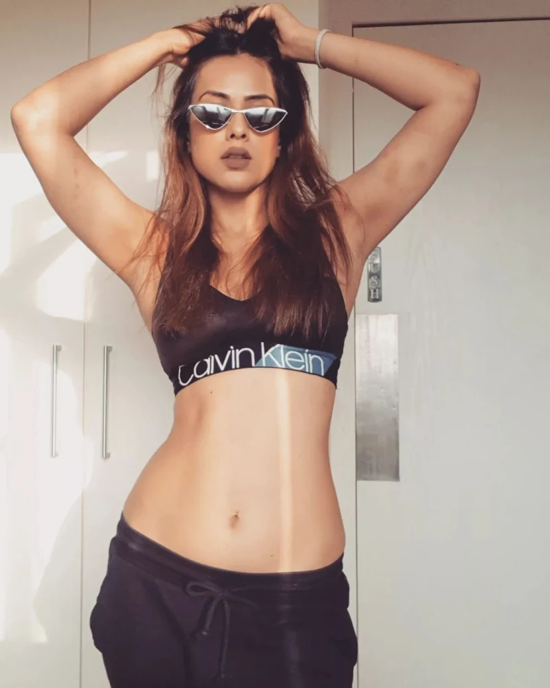 Nia Sharma sexy midriff navel calvin klein bra