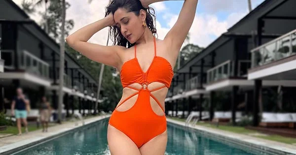 Pragya Jaiswal in orange swimsuit flaunts her fine sexy body – see now.