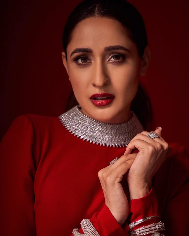 Pragya Jaiswal sexy face red outfit hot actress