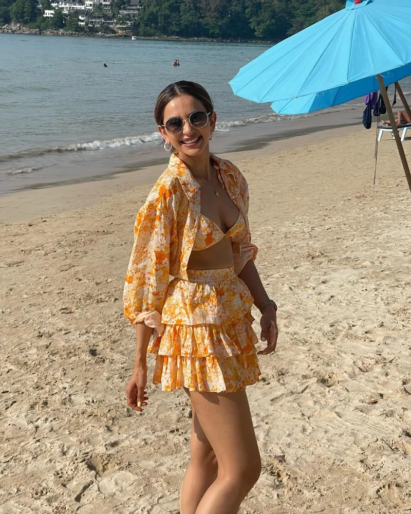 Rakul Preet cleavage sexy legs beach wear hot actress