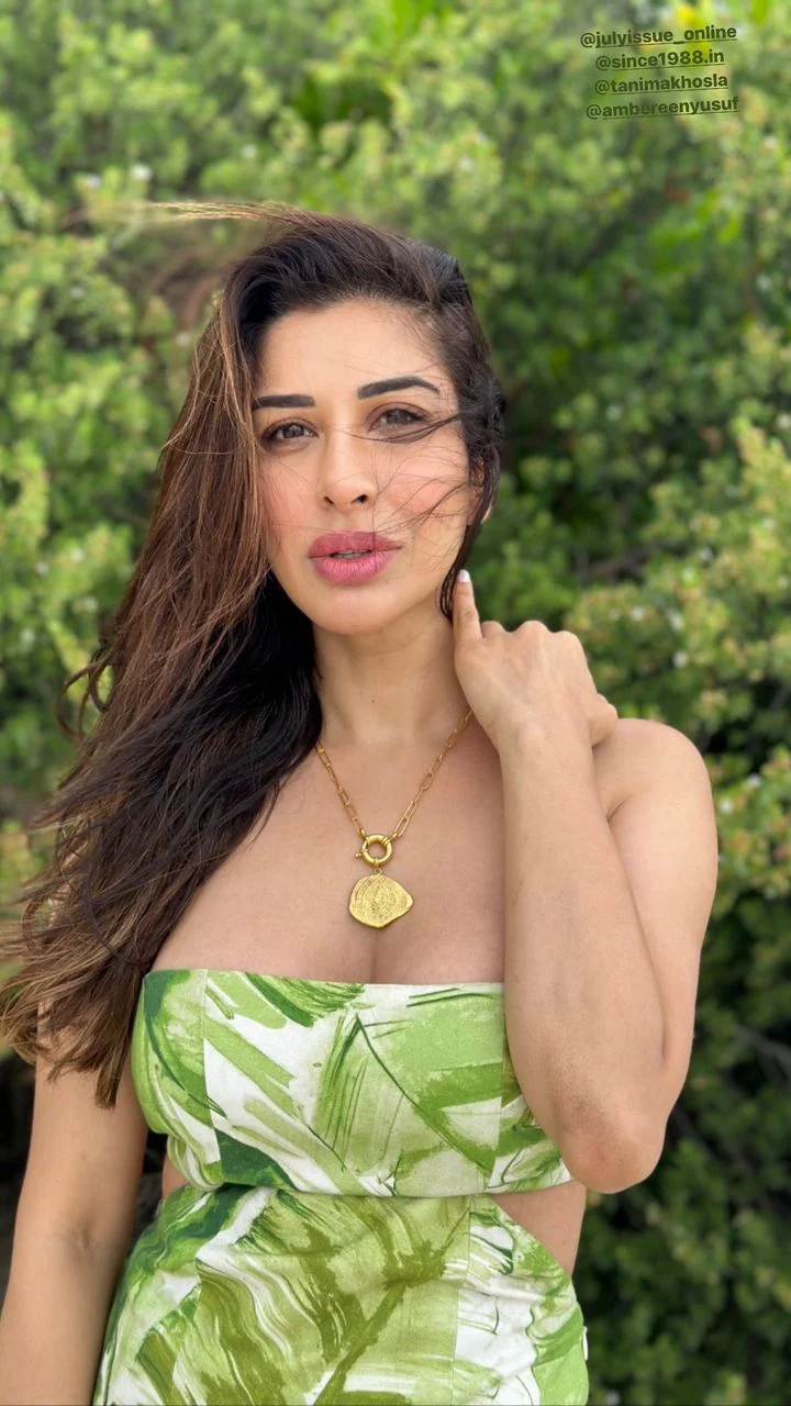 Sophie Choudry cleavage off shoulder dress
