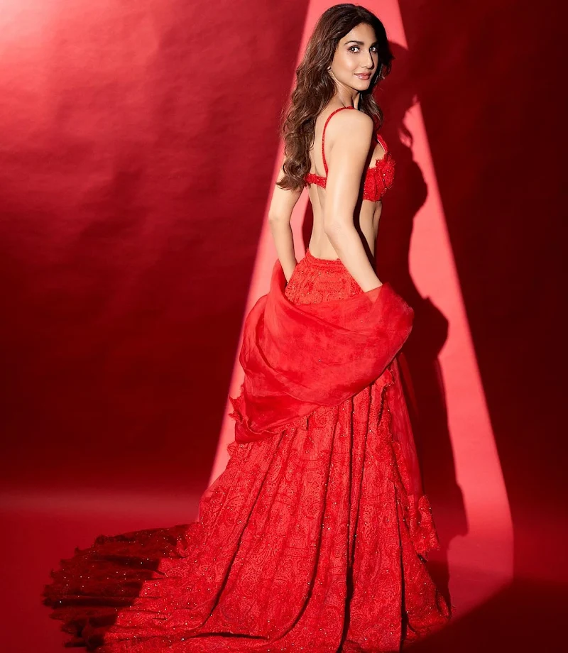 Vaani Kapoor red outfit cleavage slim toned figure