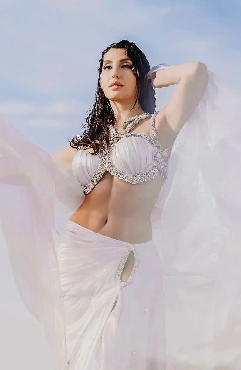 nora fatehi navel white tiny bralette high slit skirt snake 2 5 nora fatehi navel white tiny bralette high slit skirt snake 2 5