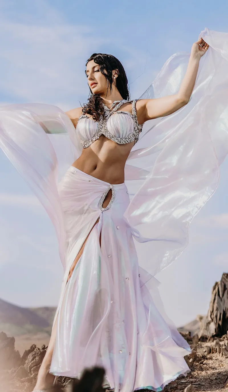 nora fatehi navel white tiny bralette high slit skirt snake 4 1 nora fatehi navel white tiny bralette high slit skirt snake 4 1