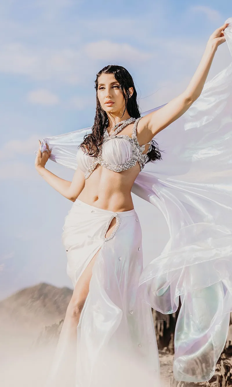 nora fatehi navel white tiny bralette high slit skirt snake 5 2 nora fatehi navel white tiny bralette high slit skirt snake 5 2