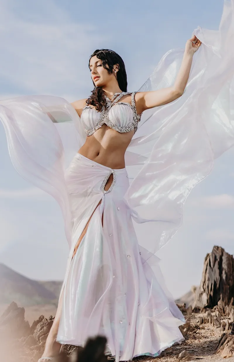 nora fatehi navel white tiny bralette high slit skirt snake 6 3 nora fatehi navel white tiny bralette high slit skirt snake 6 3