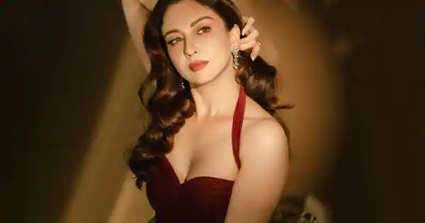 Dhurandhar actress, Saumya Tandon, defines style with sexy in this maroon dress.