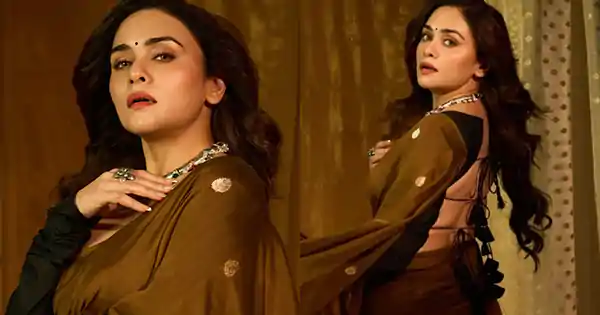 Amruta Khanvilkar in silk saree with backless blouse looked heavenly.